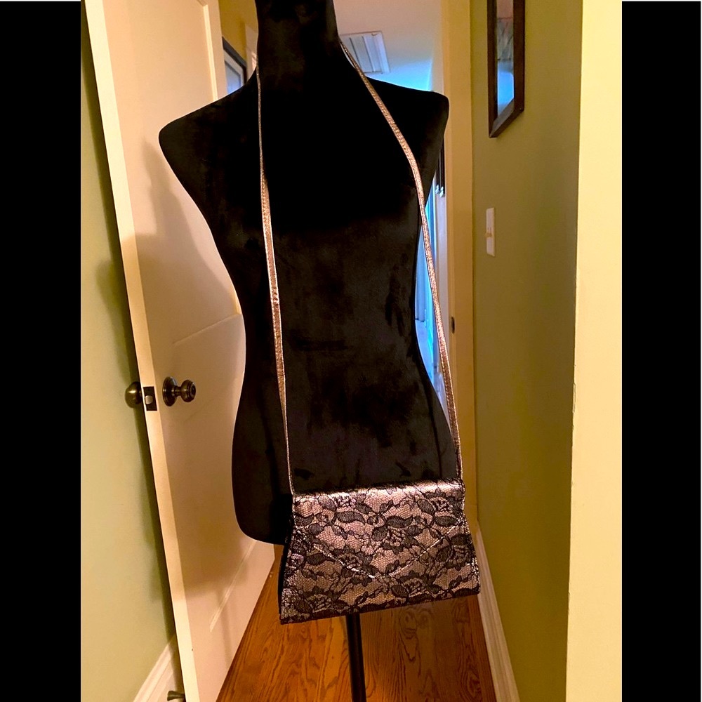 Neimns Marcus evening crossbody bag, gold and black lace with magnetic snap.